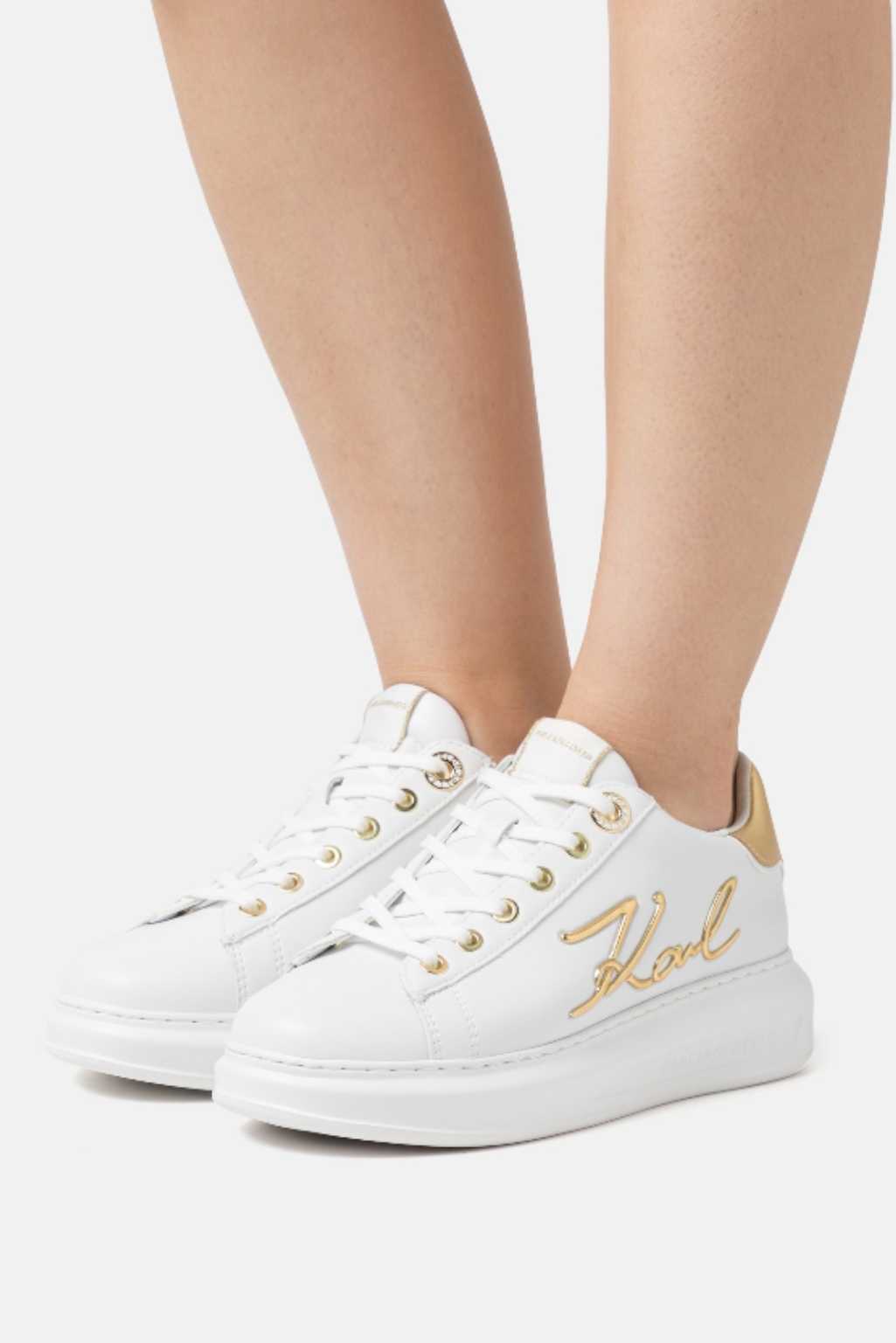 Shoes with gold logo
