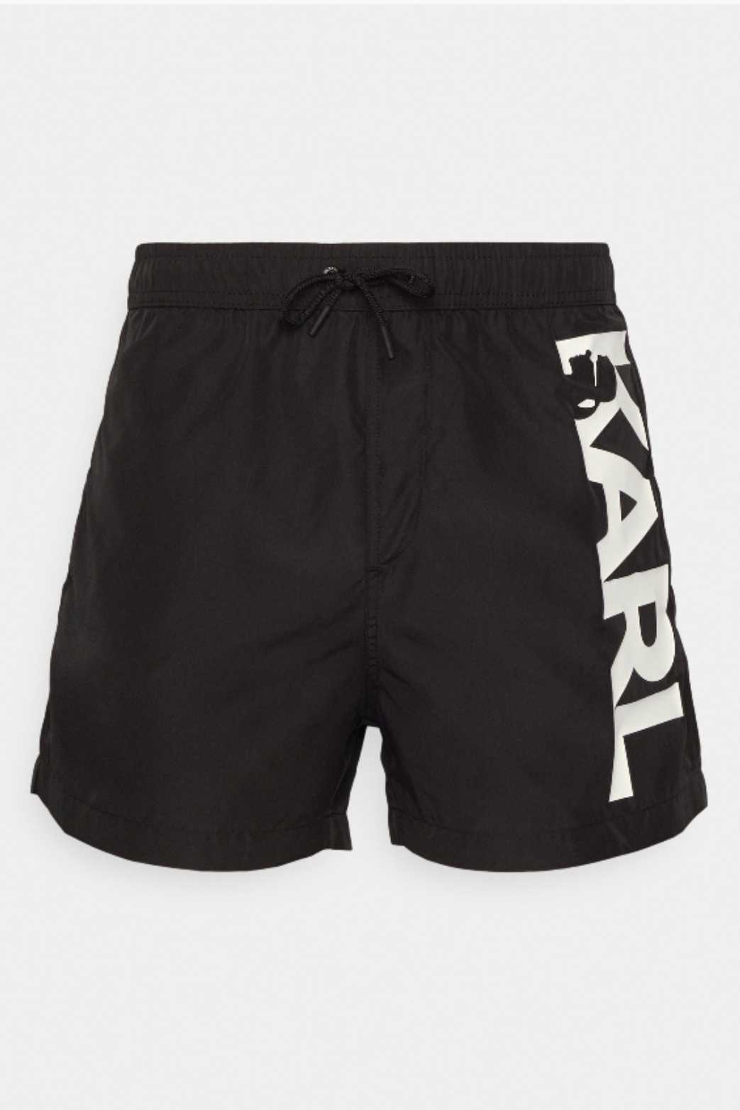 Black swim trunks with large logo