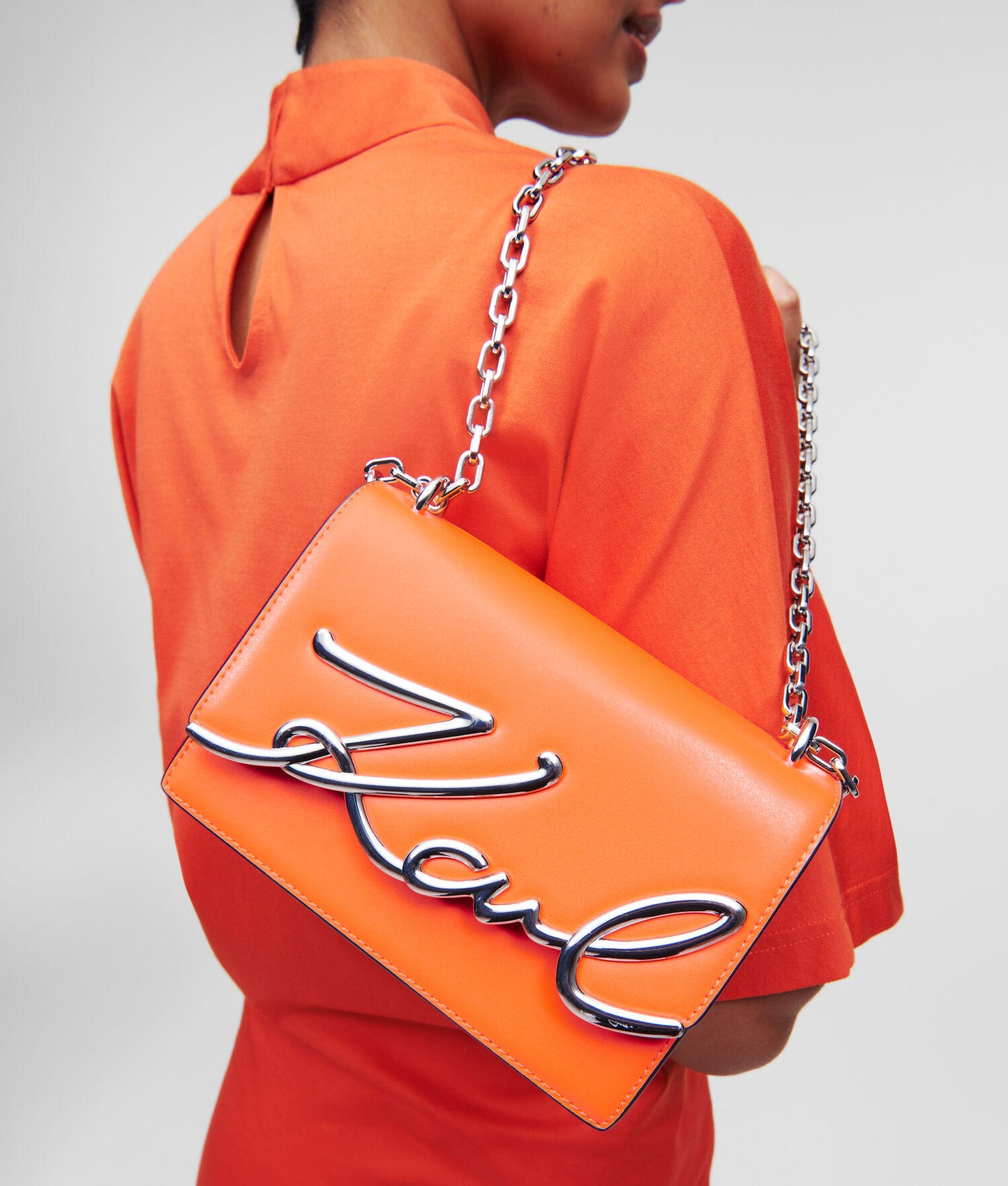 Orange bag with chain strap